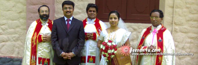 Savio Nimy Wedding Photo with Parish Priests